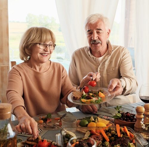 senior-couple-having-dinner-2021-08-28-23-38-57-utc